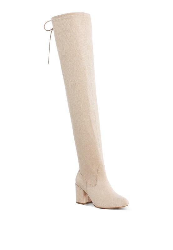 Beige knee-high boot on a white background