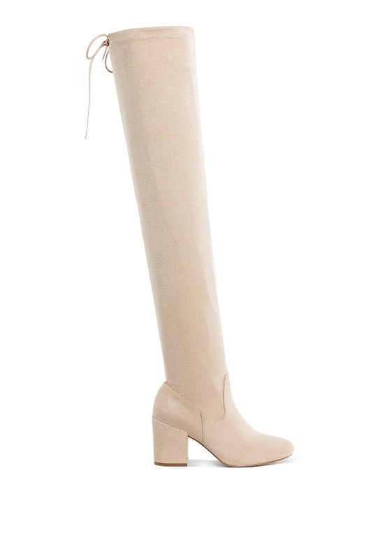 Beige knee-high boot on a white background
