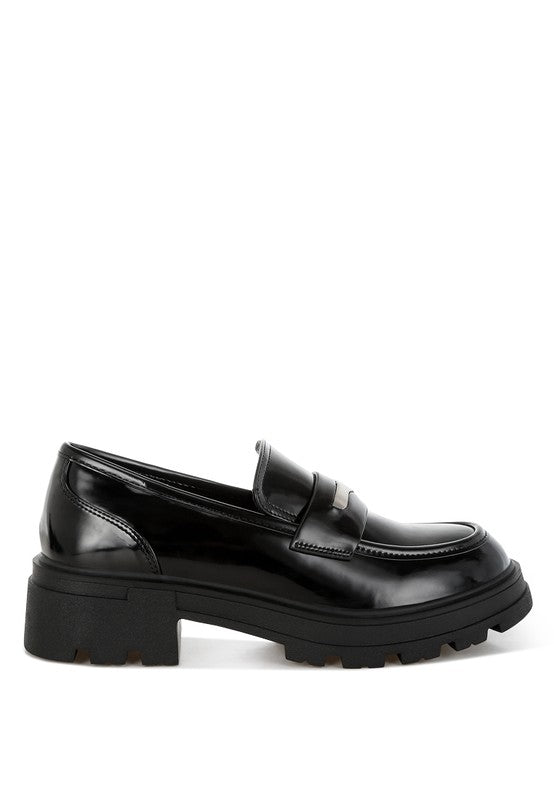 Black leather loafer shoe on a white background