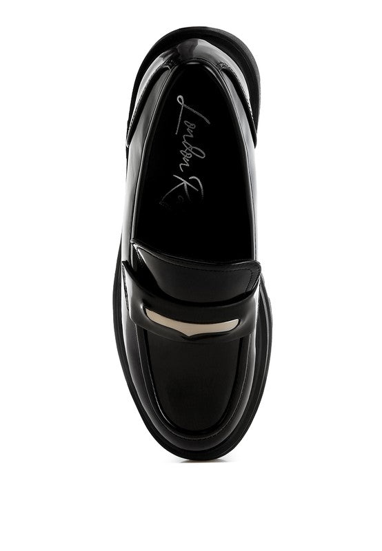 Black loafers with a brand logo on a white background