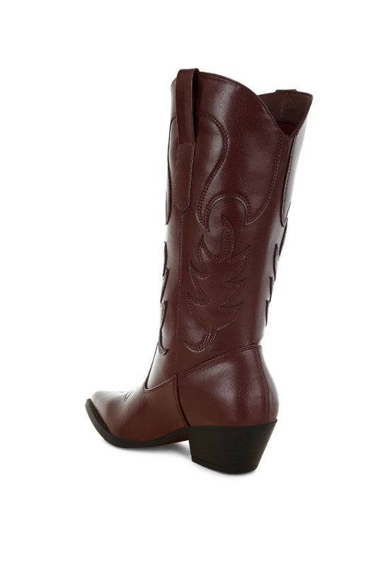 Brown cowboy boot on a white background