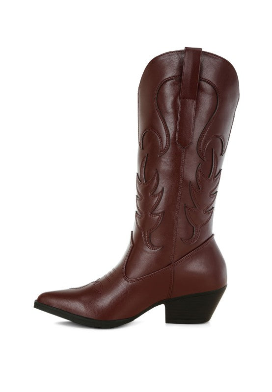Brown cowboy boot on a white background