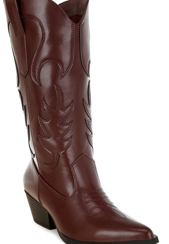 Brown cowboy boot on a white background