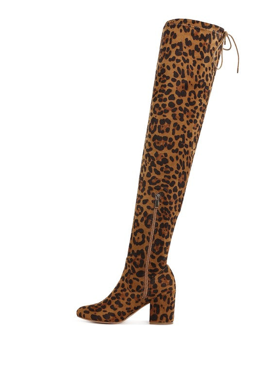 Leopard print knee-high boot on a white background