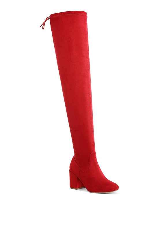 Red knee-high boot on a white background
