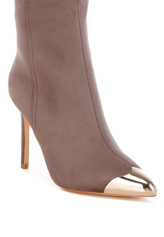 Gray high-heeled boot with rose gold cap toe on a white background